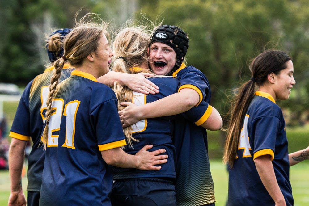 ACT's Tayla Stanford is congratulated by teammates after scoring against NSW Country. Photo: ARU Media/Stu Walmsley
