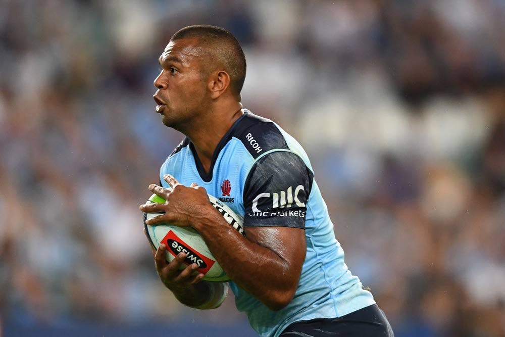 Kurtley Beale's night is over after a knee injury. Photo: Getty Images