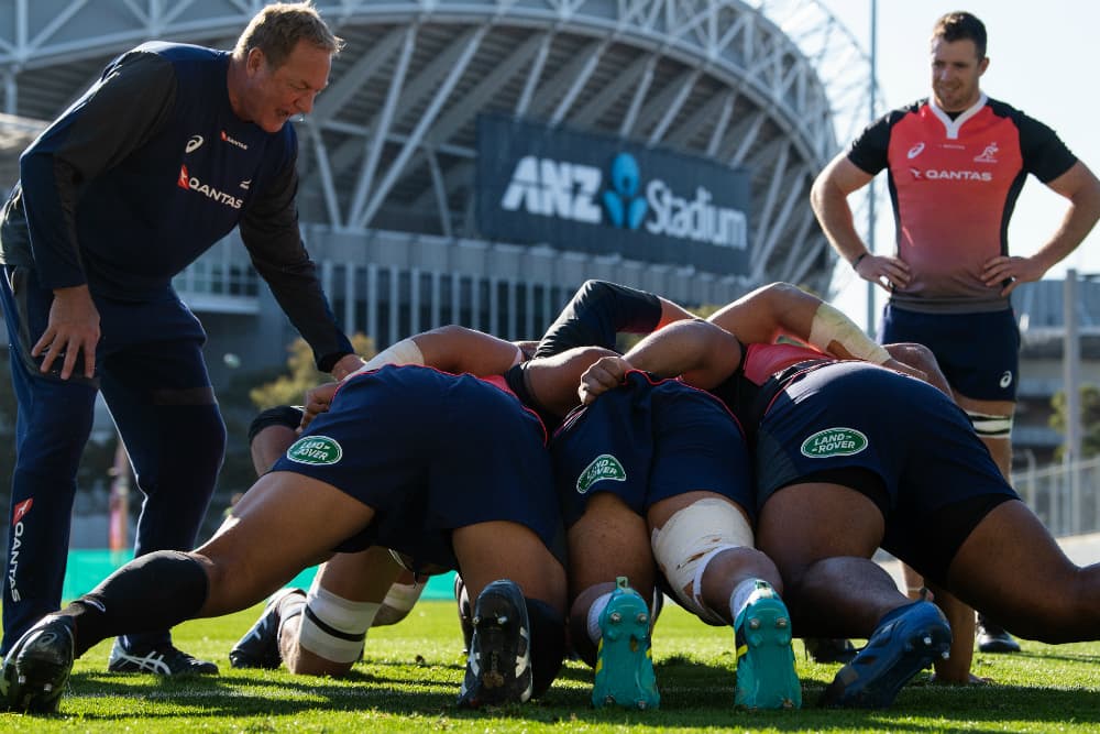 Mick Byrne corrects the technique of Wallabies front rowers near ANZ Stadium. Photo: RUGBY.com.au/Stuart Walmsley