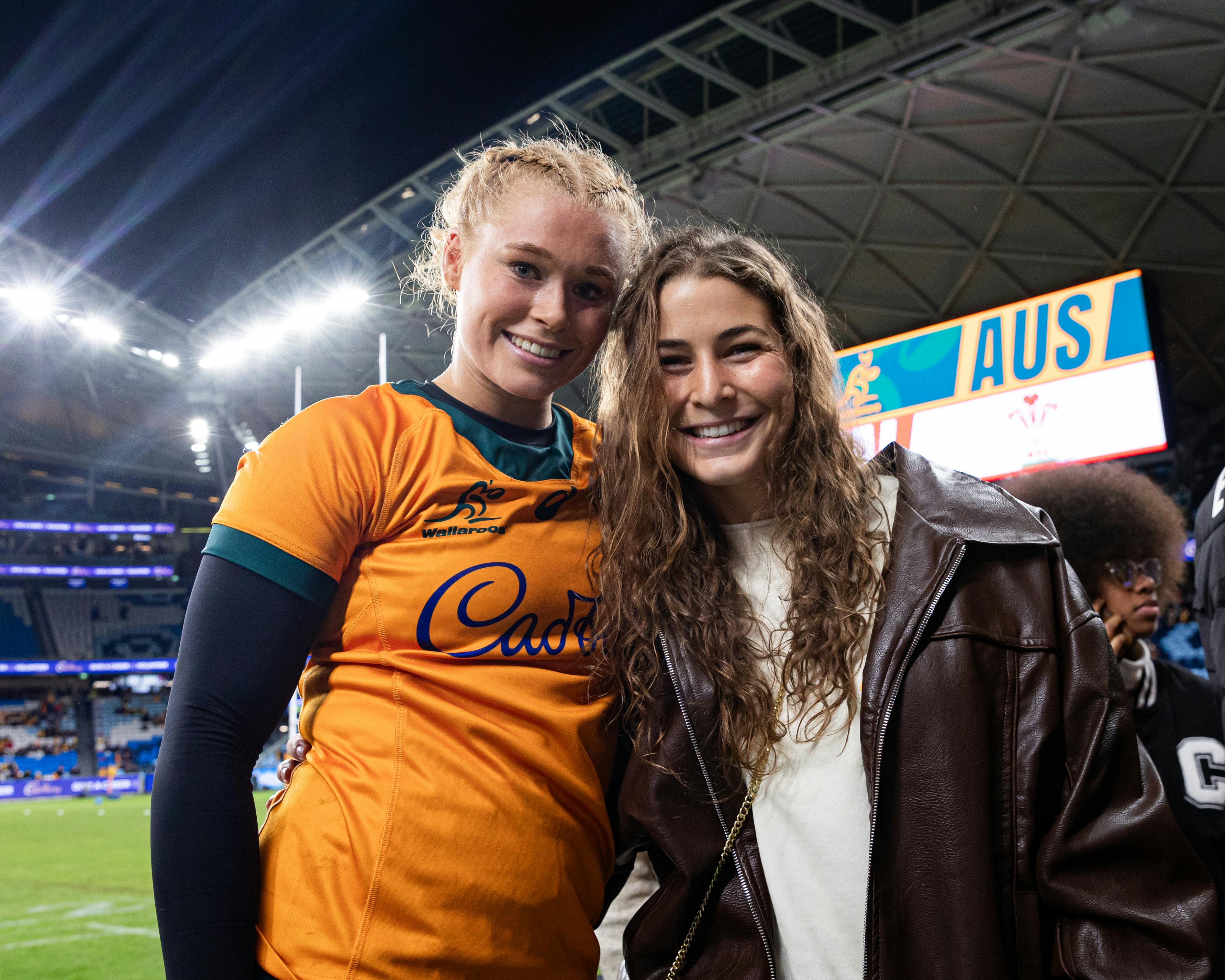 Kaitlin Shave (right) with good friend Nat Wright after her Wallaroos debut. Photo: Brendan Hertel/RA Media
