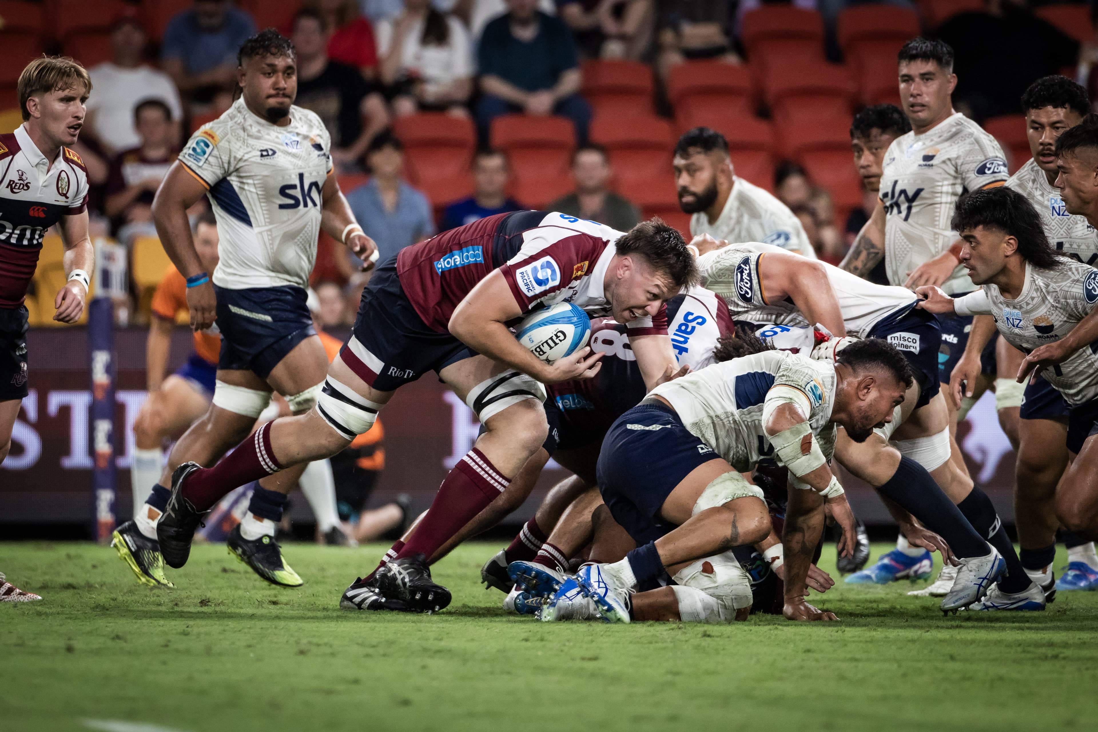 Reds lock Angus Blyth drives ahead against Moana Pasifika this season. Photo: Brendan Hertel