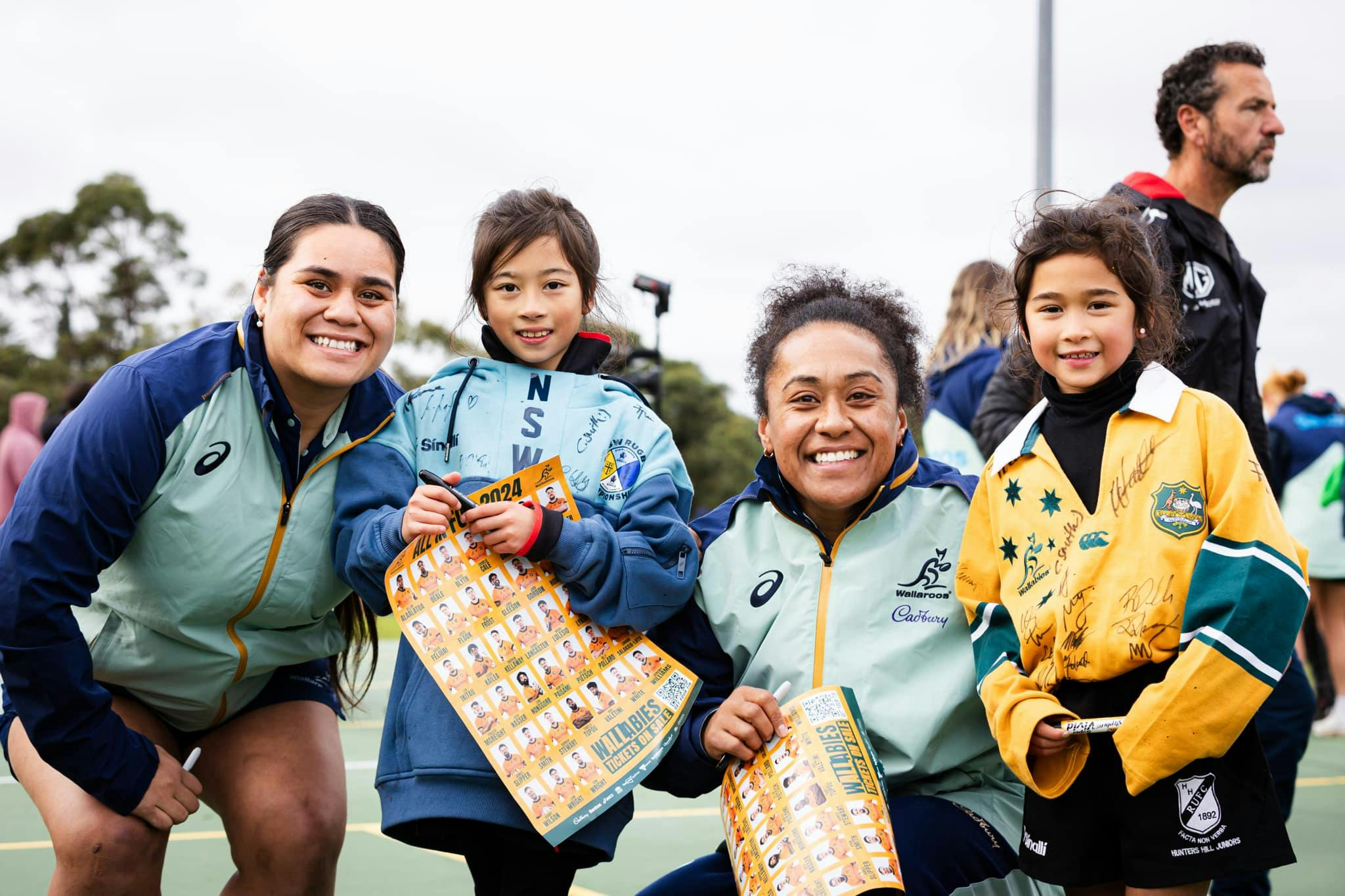 Allana Sikimeti (left) and Lydia Kavoa (right) during a Wallaroos fan day. Picture: Brendan Hertel