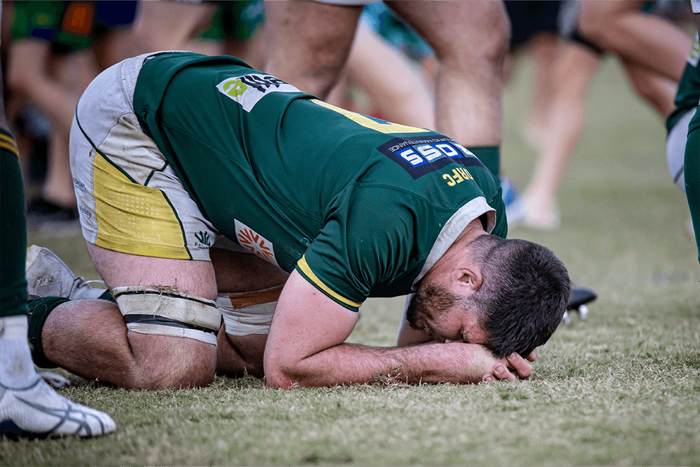 Wests backrower Connor Anderson is a picture of despair after the semi-final loss to GPS last year. Photo: QRU Media/Brendan Hertel.