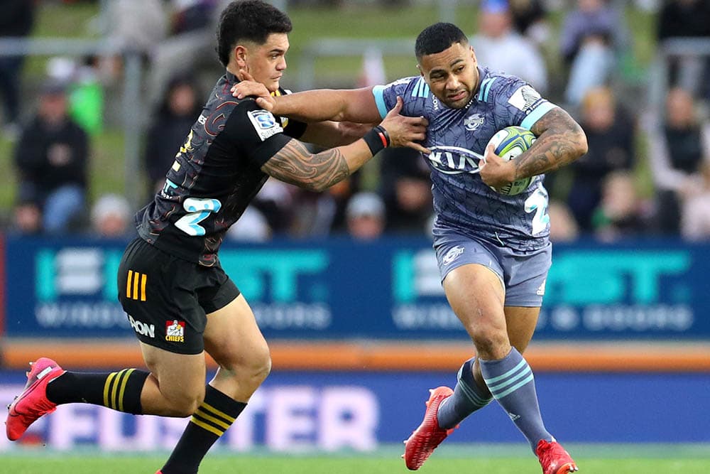 Ngani Laumape fends off Tumua Manu. Photo: Getty Images