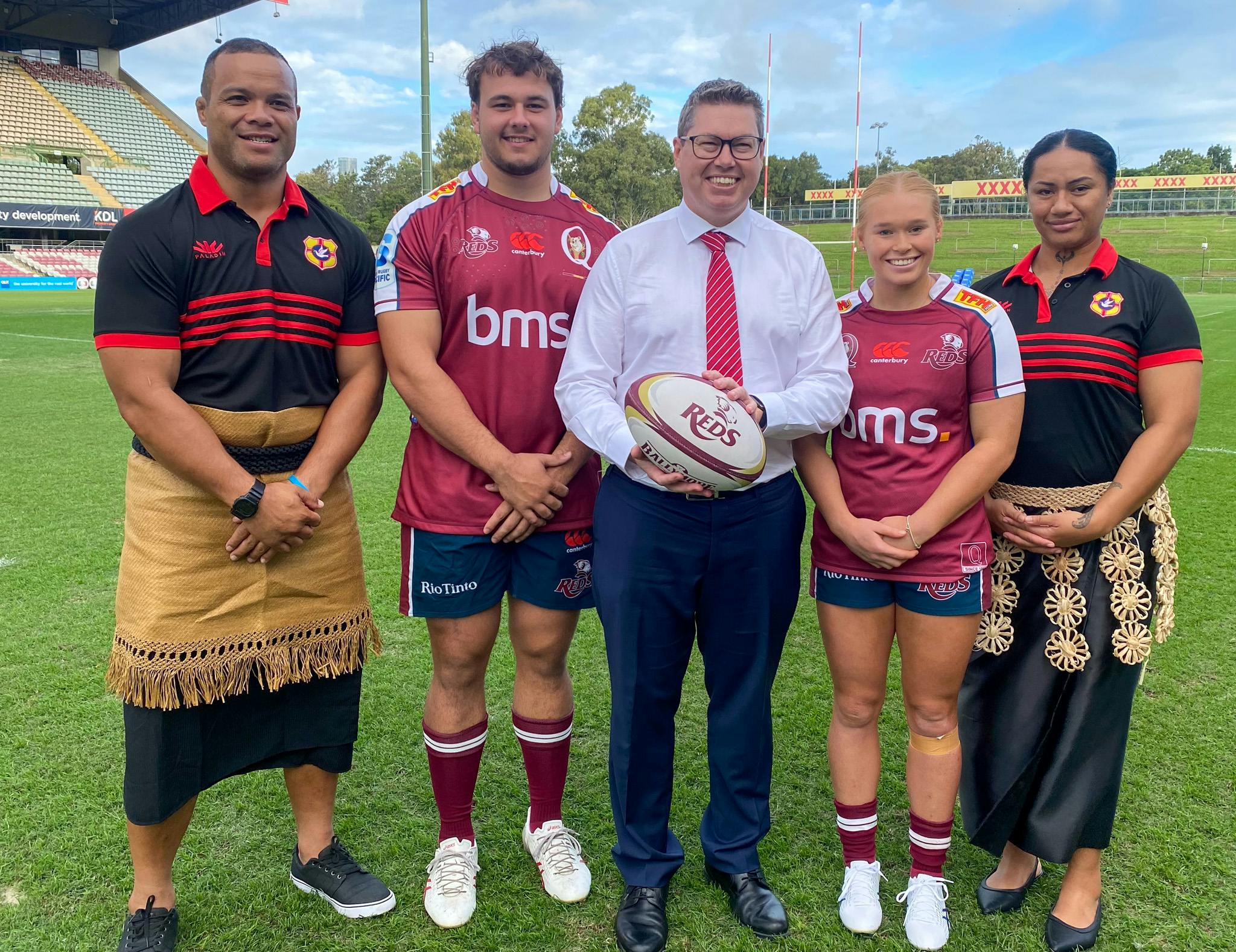 Minister for International Development and the Pacific, the Hon Pat Conroy MP, at Ballymore Stadium announcing the landmark rugby tour of Tonga for the Queensland Reds men's and women's teams with from (left) Tongan women's coach Eddie Aholehei, Reds prop Massimo De Lutiis, Reds halfback Nat Wright and Tongan women's prop Ayla Cook.