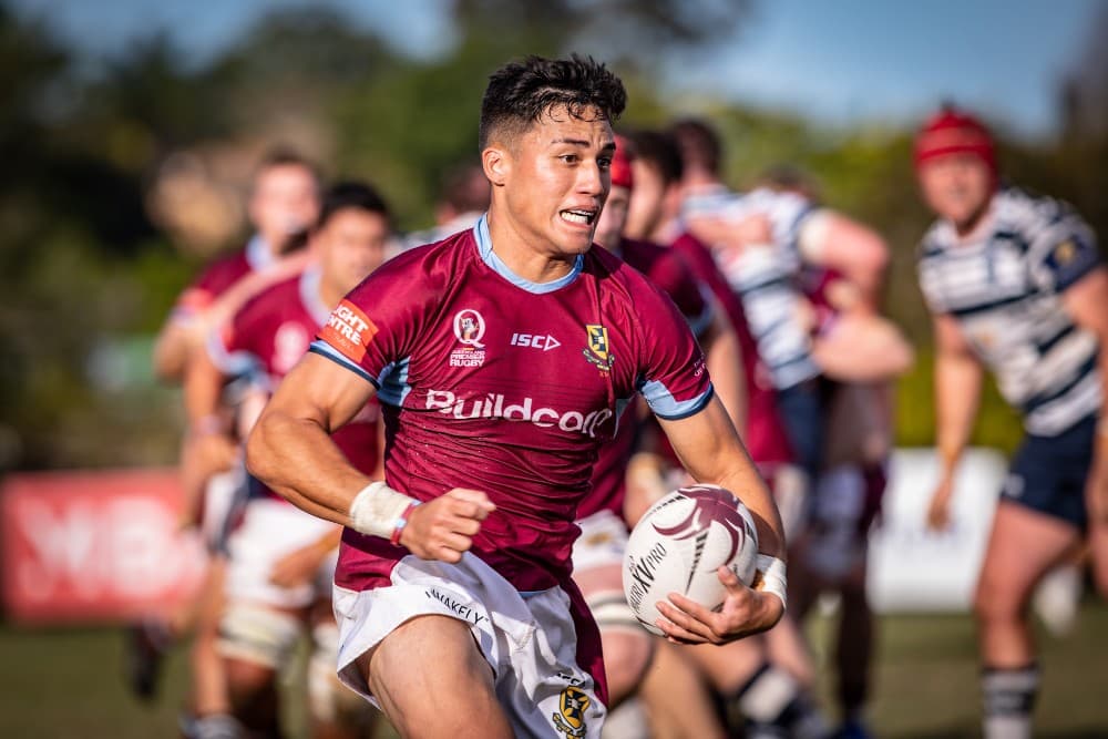 UQ halfback Kalani Thomas takes off for the tryline. Photo: Brendan Hertel, QRU Media