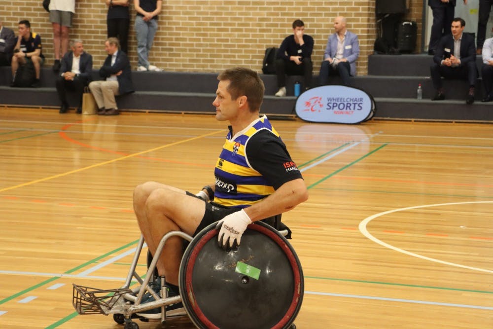 Richie McCaw taking part in a Wheelchair Rugby game