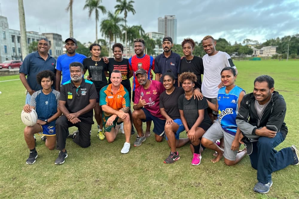 Australian Deaf Rugby head coach David Kearsey coaching in Fiji with some deaf Rugby players. Photo Supplied