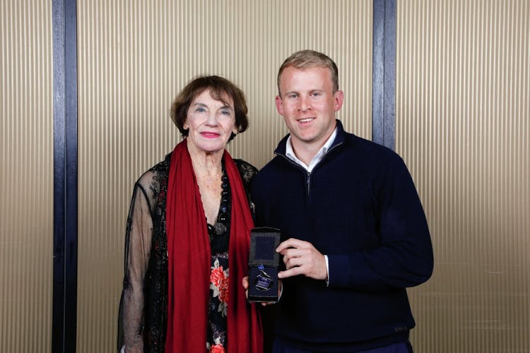 Randwick half Andrew Deegan with Mrs June Catchpole after taking out the Ken Catchpole Medal. Photo: Karen Watson for Sydney Rugby Union