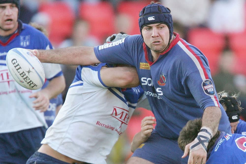 Sean Maloney offloading during his Manly days. Photo: Getty Images