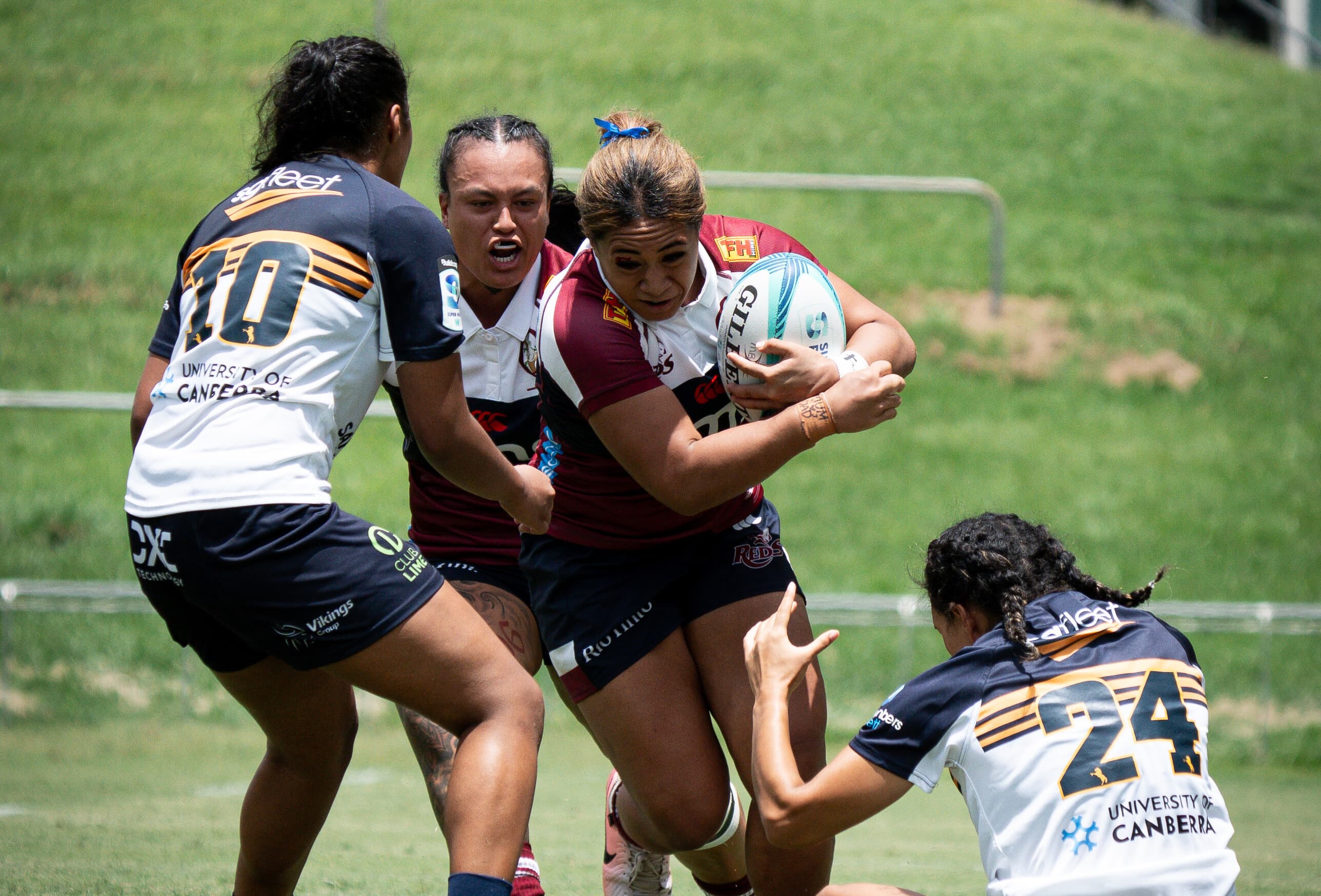 Teenaged Reds centre Shalom Sauaso powers into the Brumbies defence. Photo: Neha Kumar